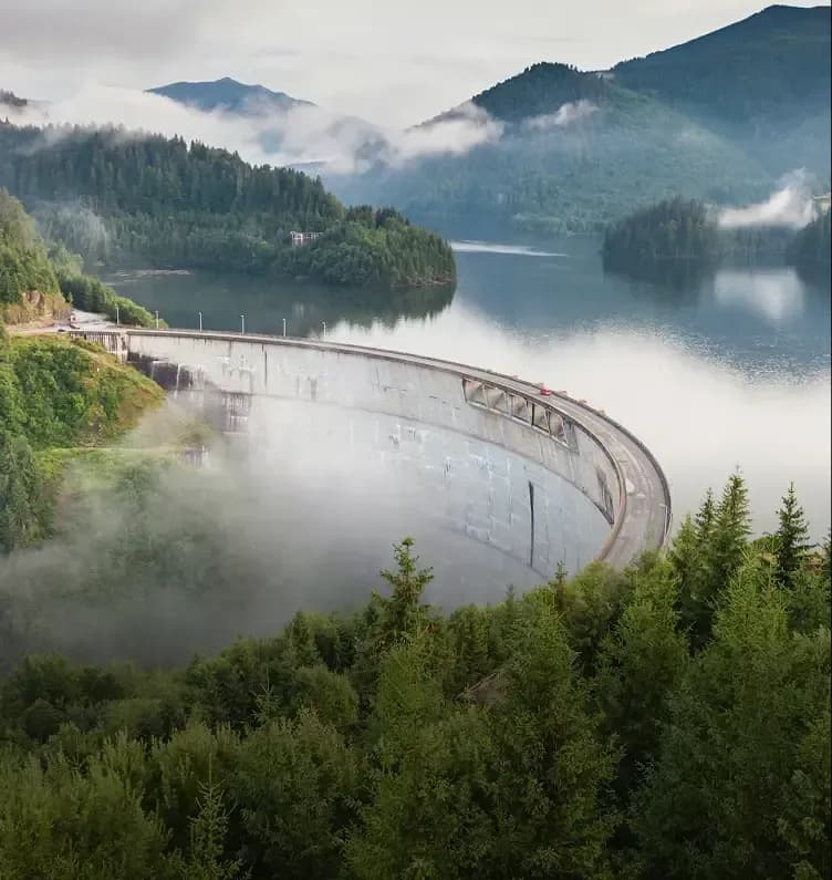 Dam in misty landscape